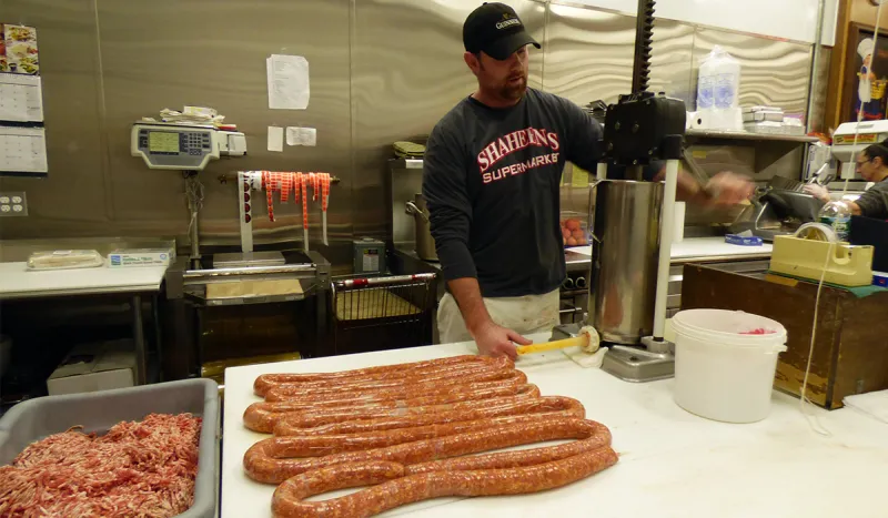 Busy behind the scenes making the famous "Joe's Italian Hot Sausage"