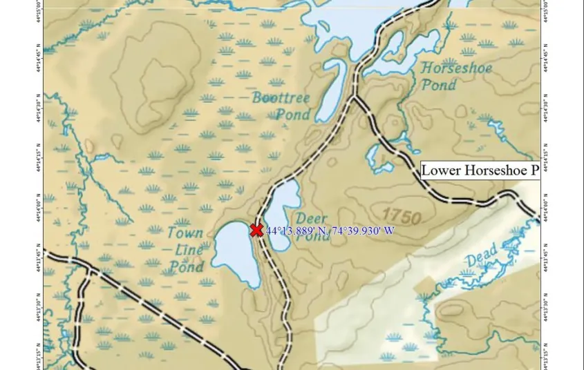 A map showing some roads&#44; bodies of water&#44; and various other features