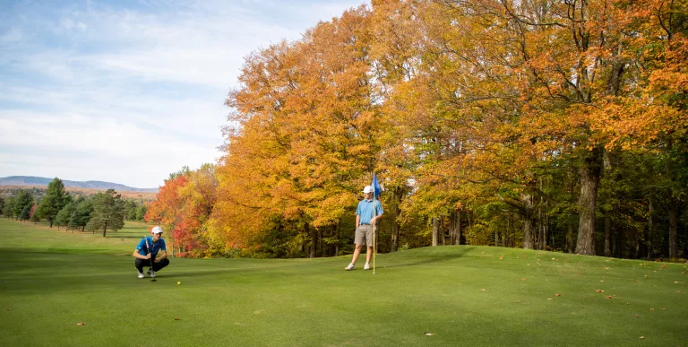 Player on the course in autumn