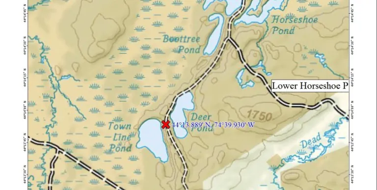 A map showing some roads&#44; bodies of water&#44; and various other features