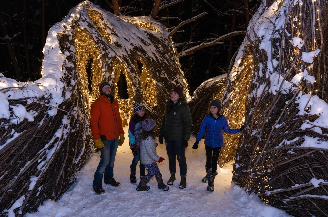 A family enjoying Wild Lights.