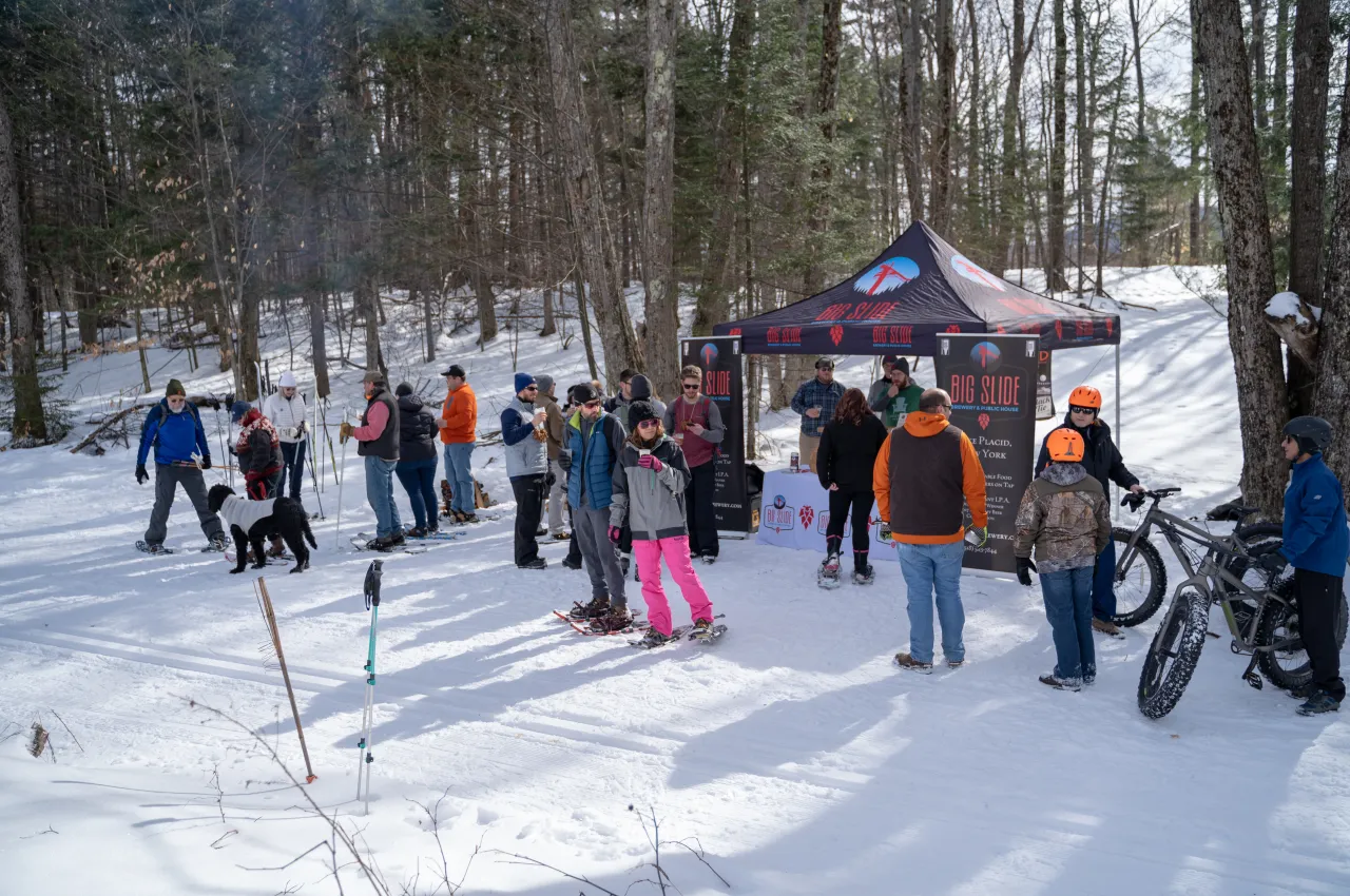 A group at a beer tasting tent at the BrewSki.