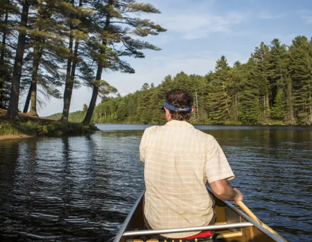 A person paddling a canoe