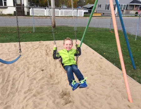 Washington Street Park has 4 swings and 5 slides.