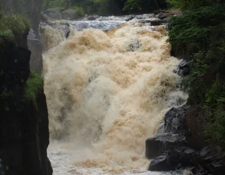 A raging narrow section of water