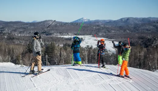 A group of skiers on top of Mount Pisgah