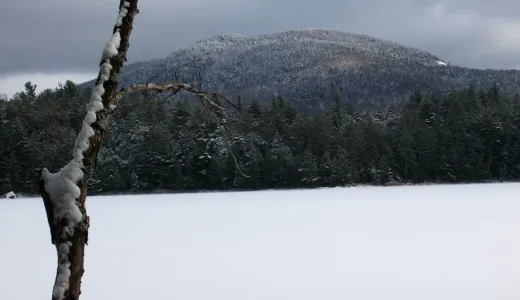 Frozen Stony Creek Ponds with the view of a mountain.