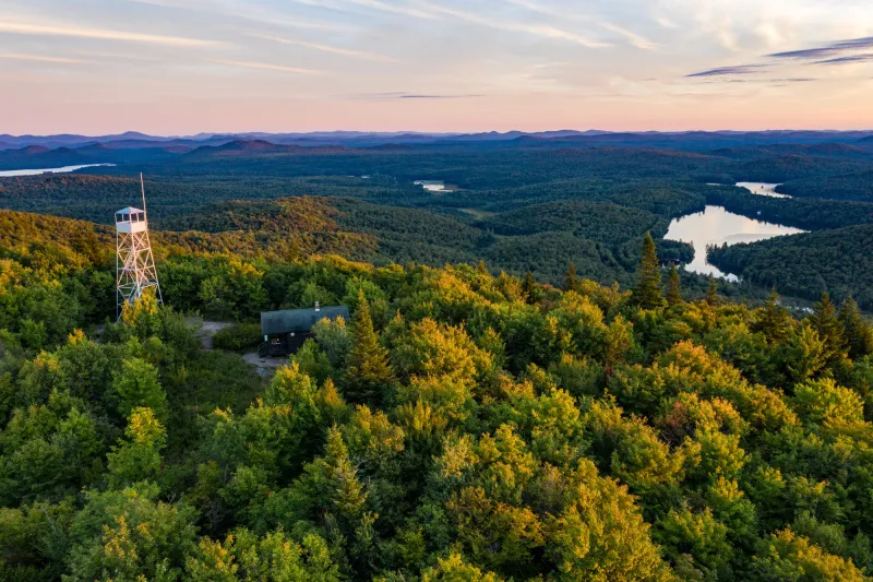 Aerial view of a firetower during sunset