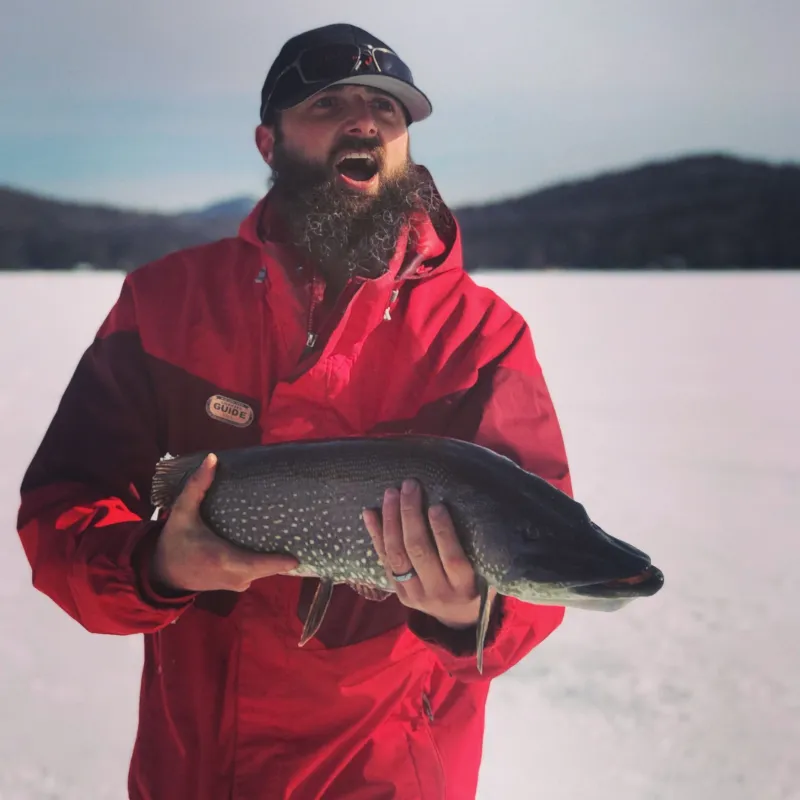 Andrew holding a fish