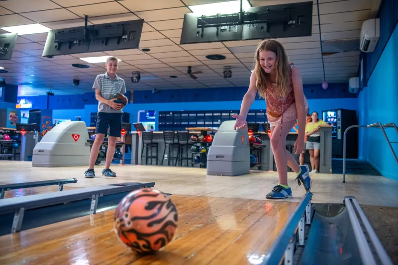 Two kids bowling at Lakeview Lanes.