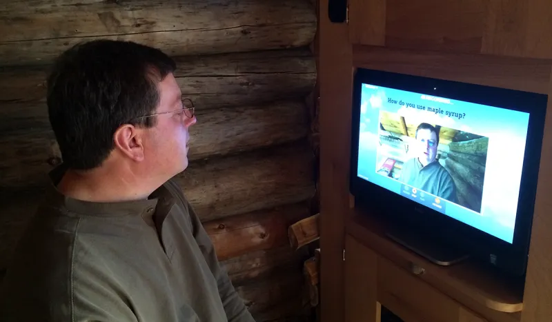 Dave St. Onge demonstrates some of the interactive elements in the new Maple Exhibit at The Wild Center