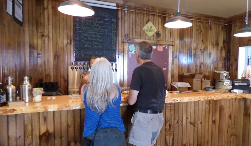 What's on tap? The menu board at Raquette River Brewing is always changing to include the latest seasonal beers.