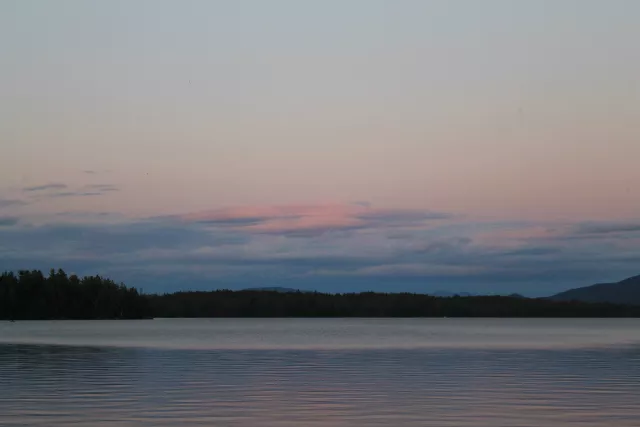 The large canvas of Tupper Lake and the frame of the mountains lets Mother Nature paint her best.