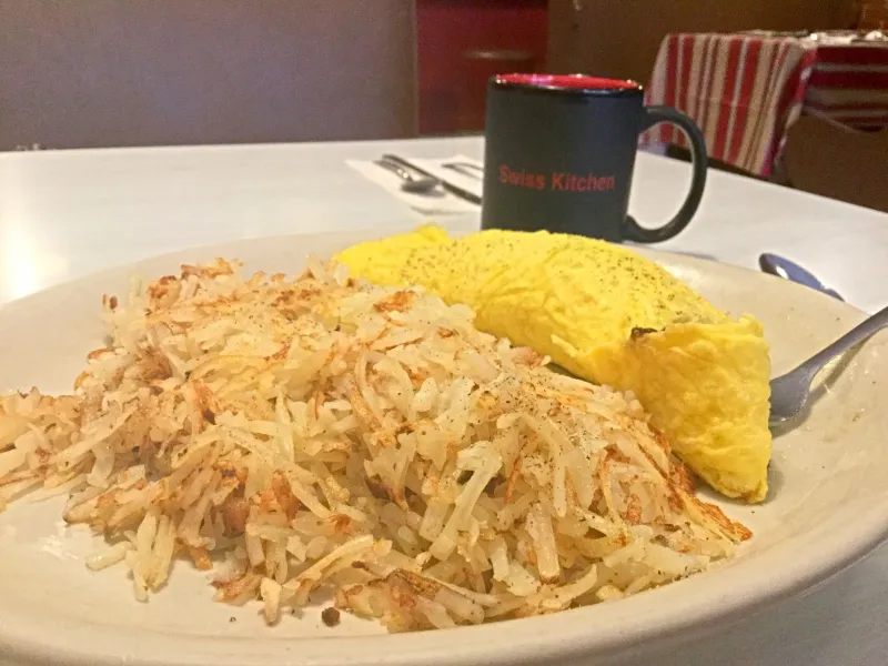 The Swiss Kitchen lets you build your own omelette. This one is cheddar, bacon, and mushrooms.