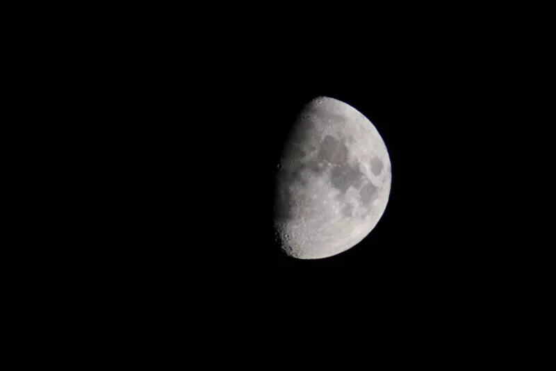 Our moon, photographed with a DSLR and 70-200mm lens. The dark areas are plains, created by volcanic activity billions of years ago.