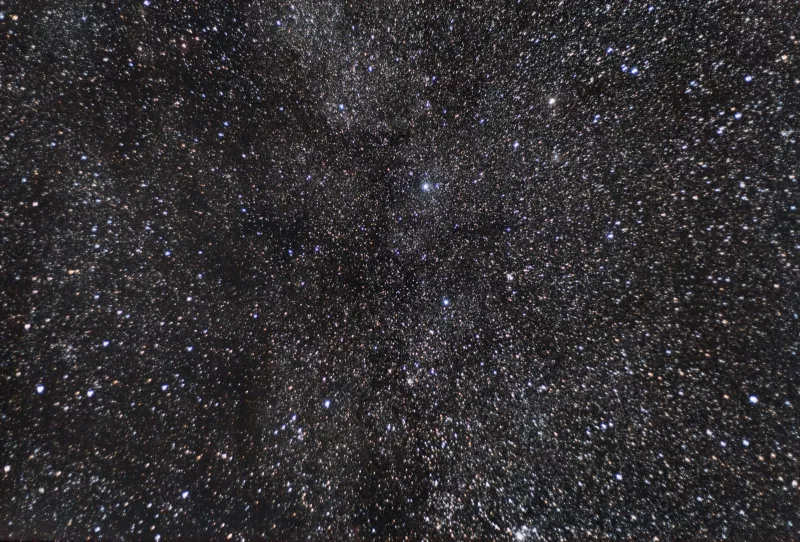 The constellation Cassiopeia and Milky Way photographed with a tracking mount. One minute exposures were stacked and processed to create the final image.