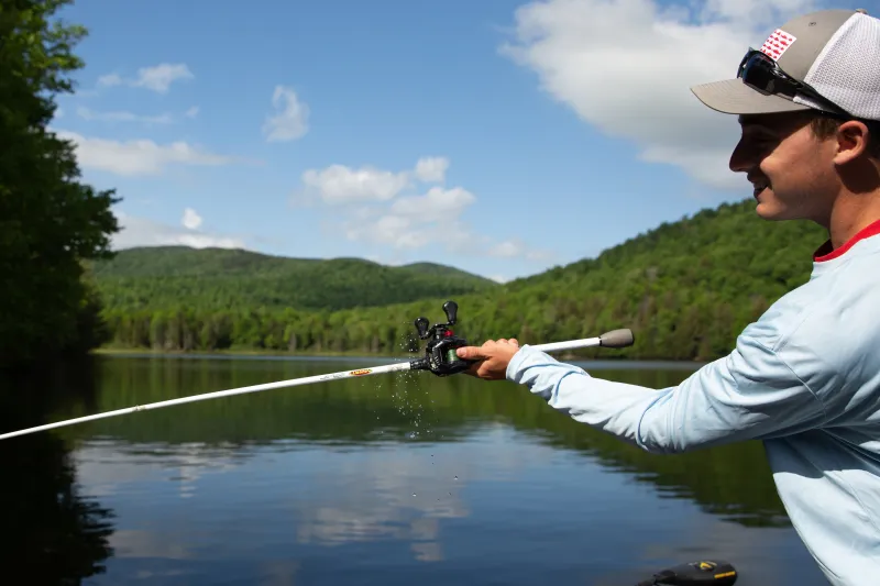 A fisherman casting a line.