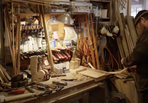 An Adirondack Guideboat builder works in his shop