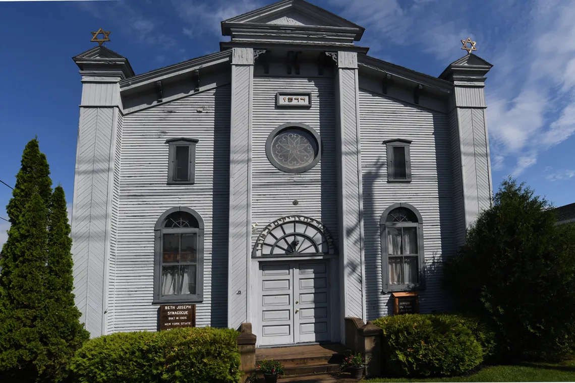 The exterior of the synagogue in Tupper Lake during the summer.