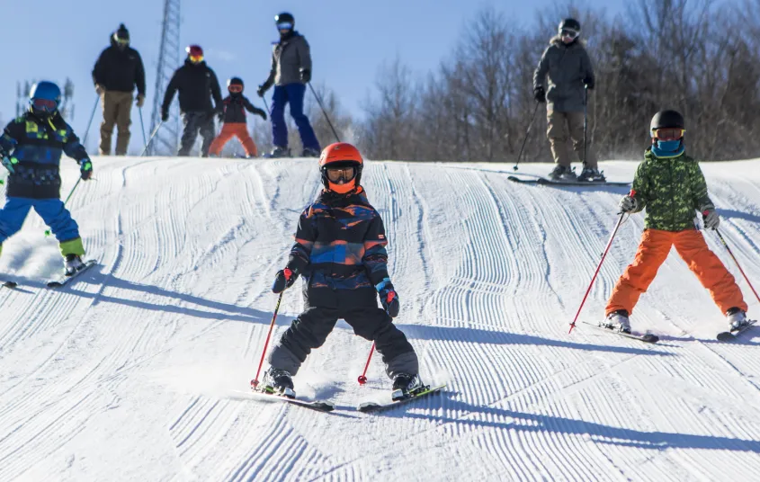 A few downhill skiers on Mt Pisgah