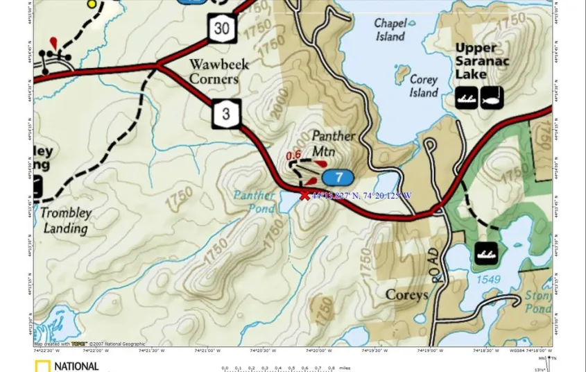 A map with a main roadway&#44; lakes&#44; and some trails.