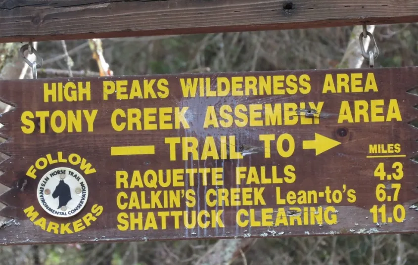 The sign at the trailhead is a reminder there's a register to sign in and out of.