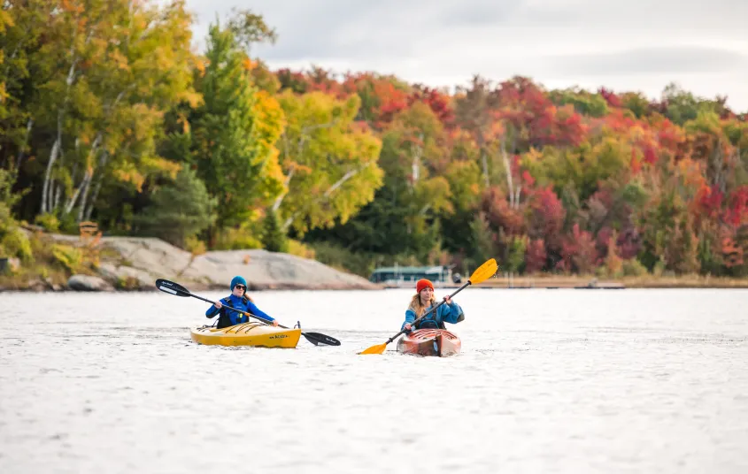 A couple kayakers in the fall